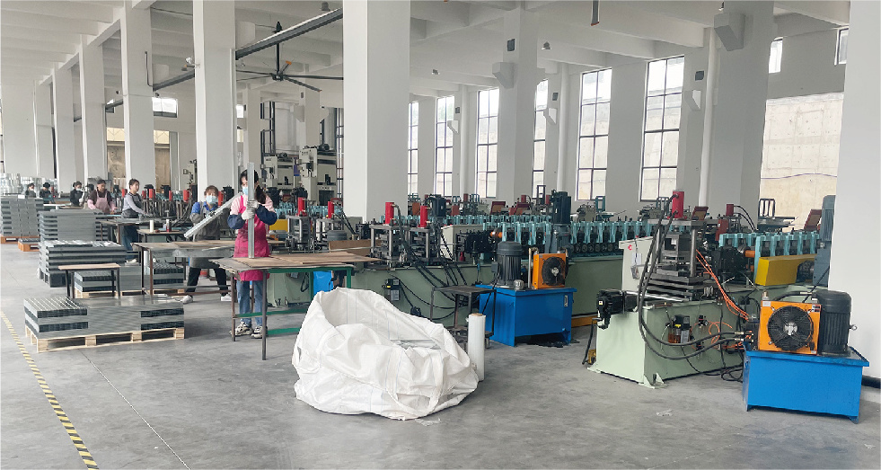 Roll forming line shaping steel shelving uprights at Xinyuan Manufacturing
